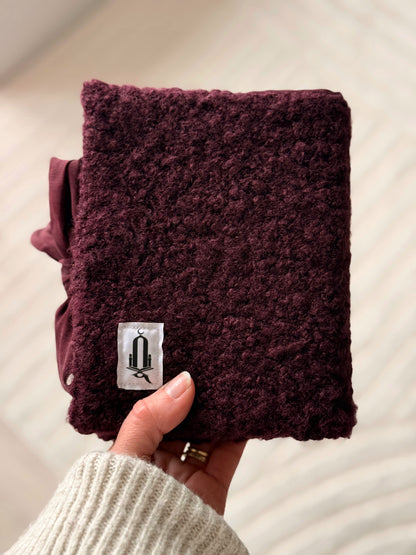 Protège-coran laine bouclé aubergine