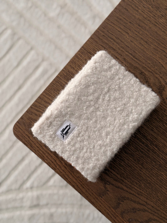 Protège-Coran laine bouclé blanc